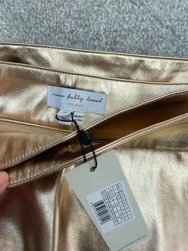Never Fully Dressed Never Fully Dressed gold vegan leather wrap style mini skirt size 8 petite