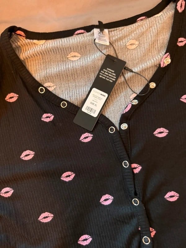 Fashion Nova Black Ribbed Romper with Pink Lips Print