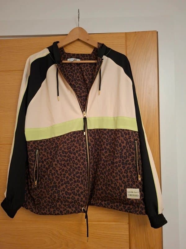 Never Fully Dressed Never Fully Dressed Windbreaker