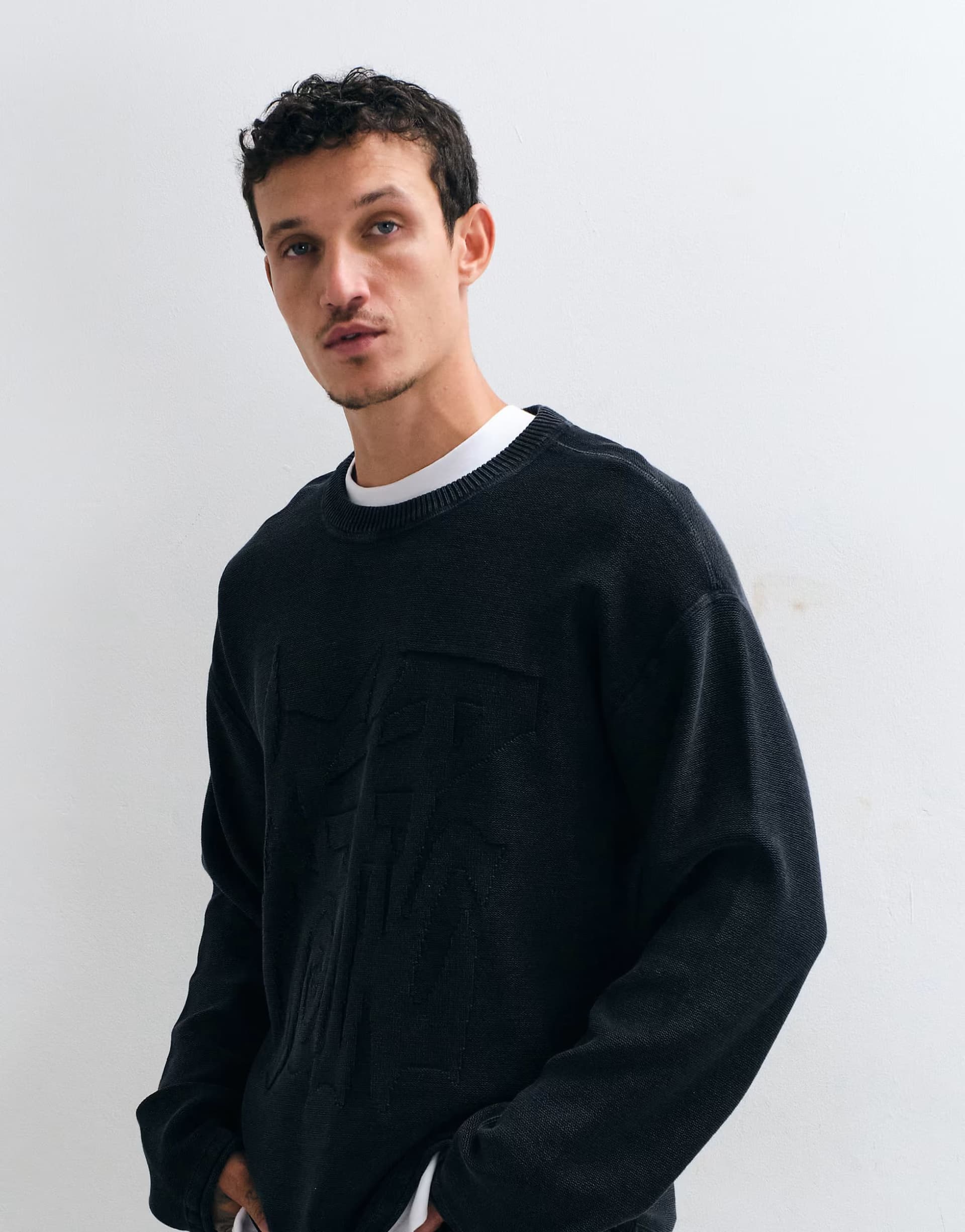 ASOS Weekday oversized jumper with keep going 3D jacquard graphic in black