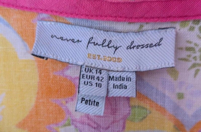 Never Fully Dressed Never fully dressed tunic embroidery on the shoulders.  Size 14 petite