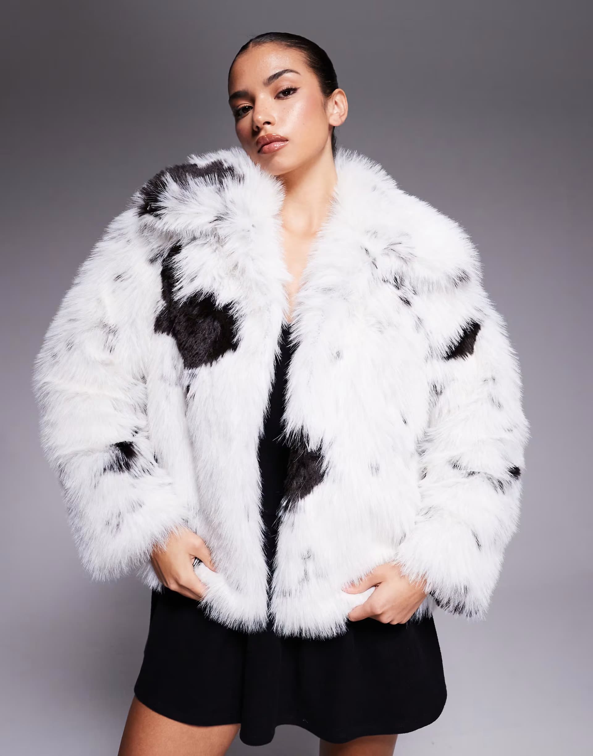 ASOS ASOS DESIGN top collar faux fur coat in cream and black cow print