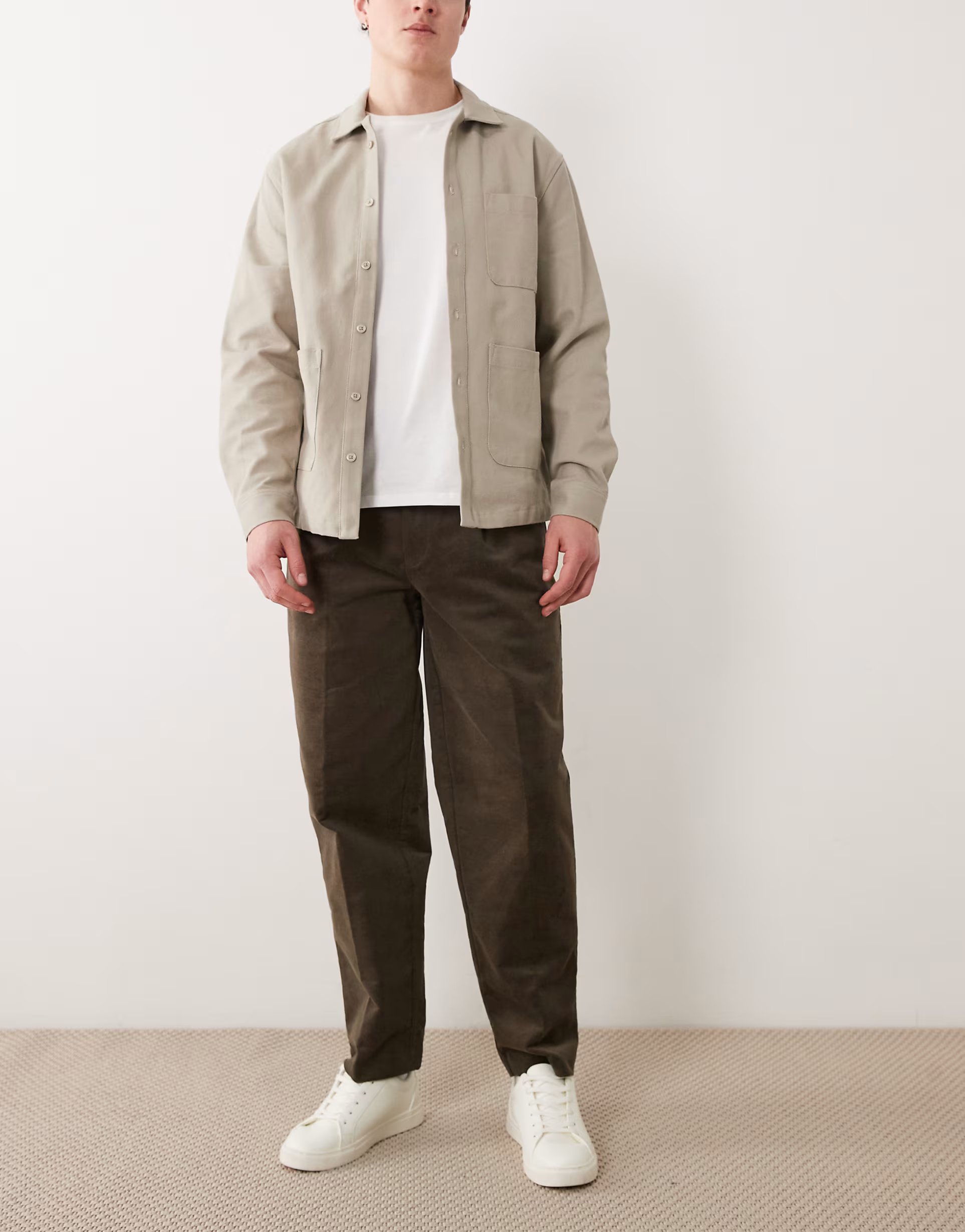 ASOS ASOS DESIGN smart pleated cotton rich oversized tapered trousers in brown corduroy - 1