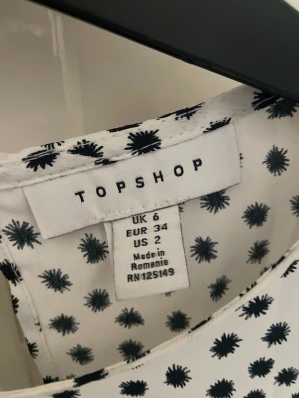 Topshop Topshop peplum blouse with open back