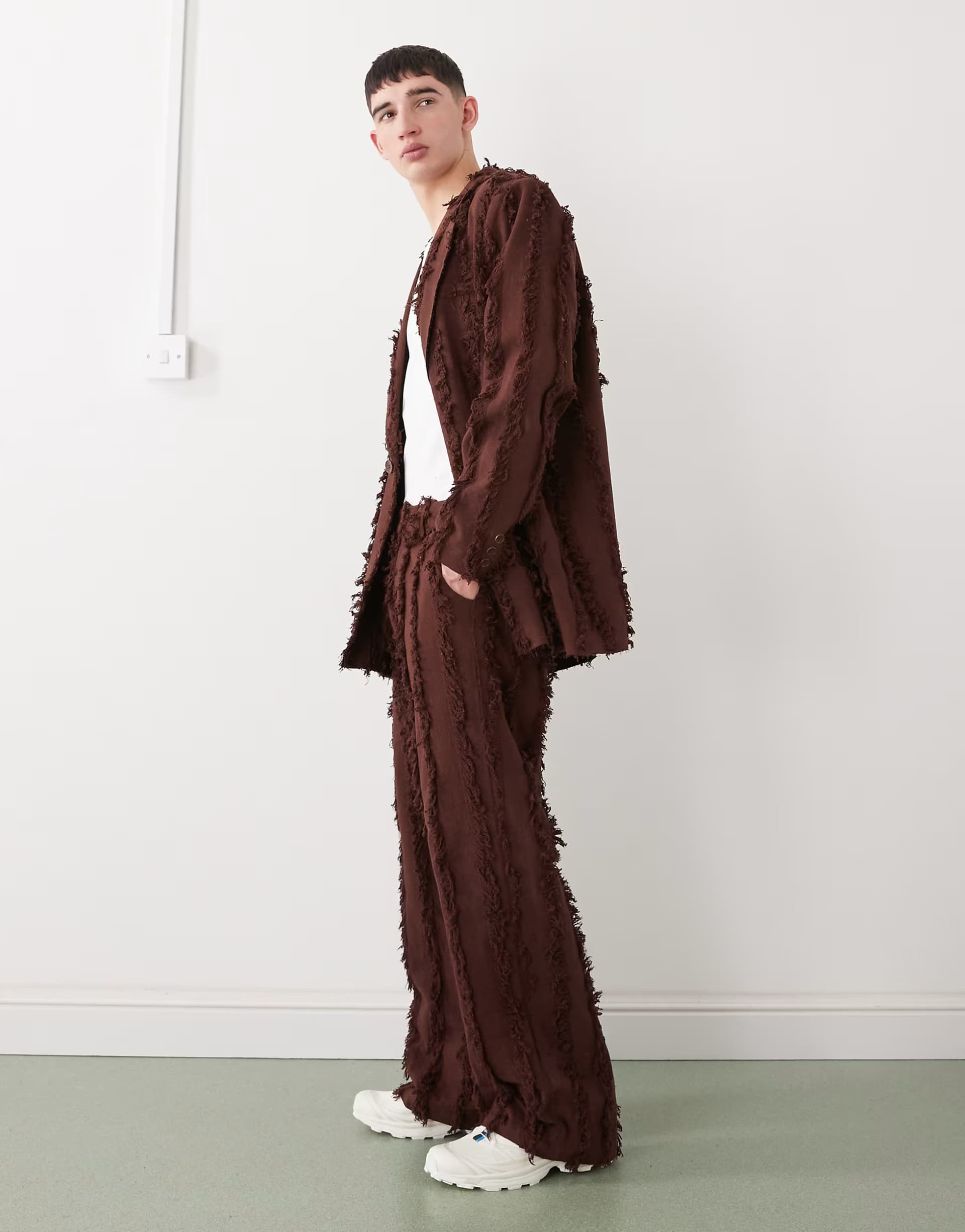 ASOS Reclaimed Vintage tailored trousers in brown with fraying