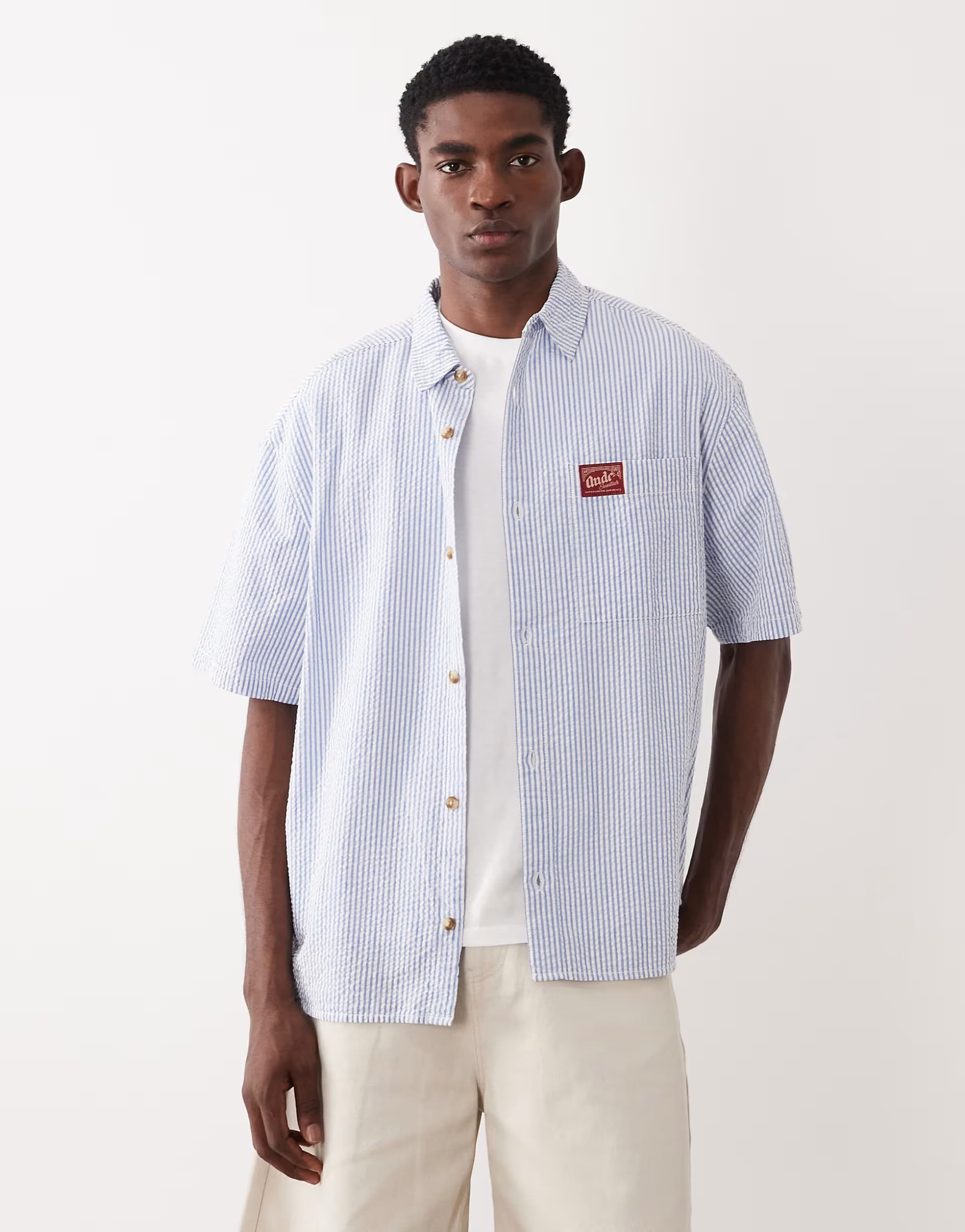 ASOS ASOS DESIGN oversized stripe shirt with badge in blue