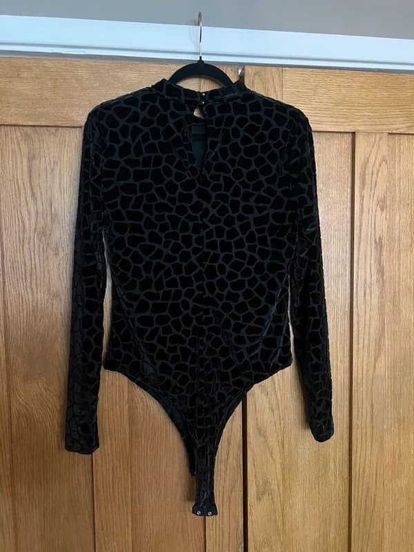 Never Fully Dressed Never Fully Dressed bodysuit