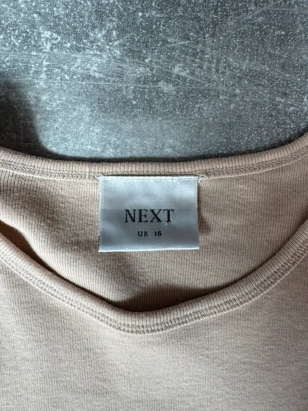 Next y2k beige glitter embellished graphic basic baby tee - 1