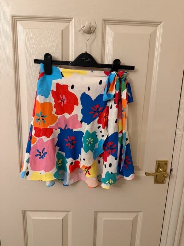 Never Fully Dressed Never fully dressed floral wrap skirt