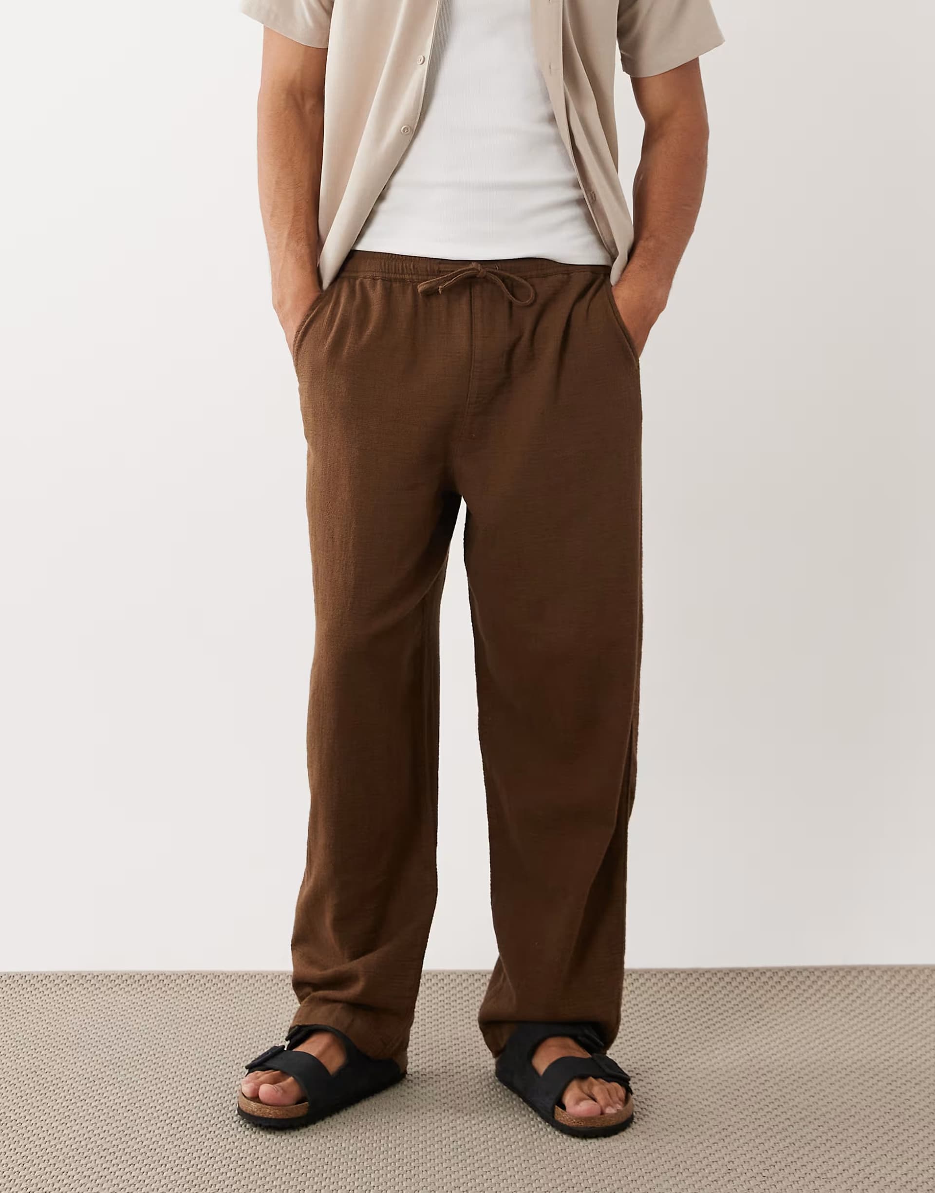 ASOS ASOS DESIGN loose straight textured trousers in brown with elasticated waistband