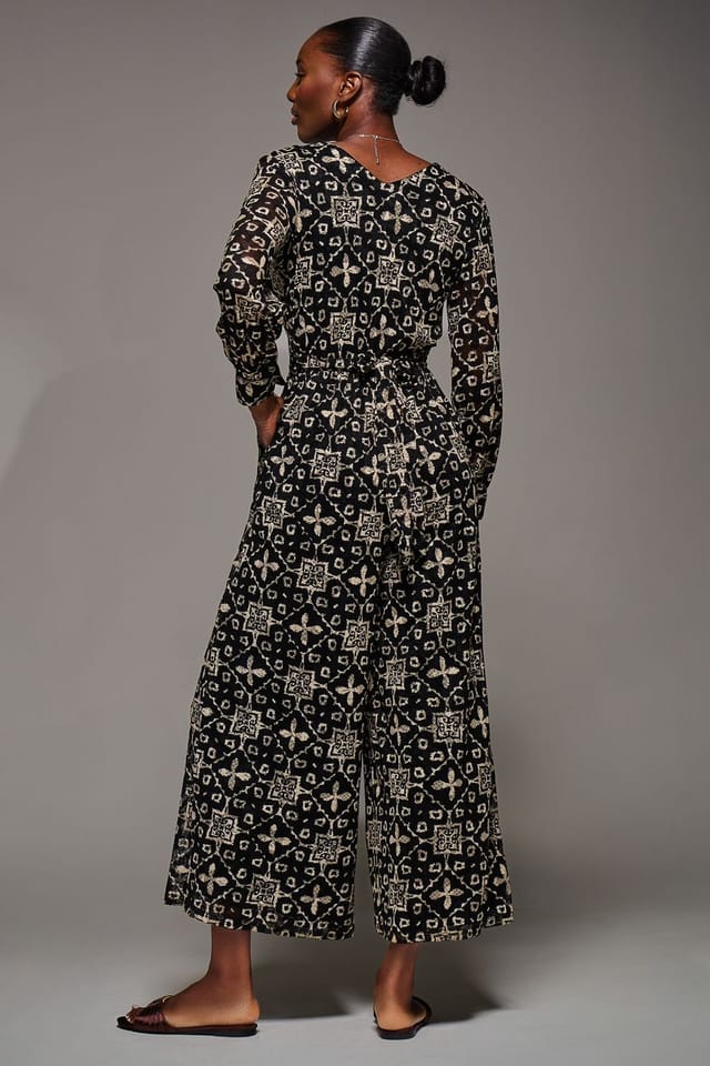 Jolie Moi Jolie Moi Women's Lace Wrap Tie Waist Long Sleeve Jumpsuit in Black - 2