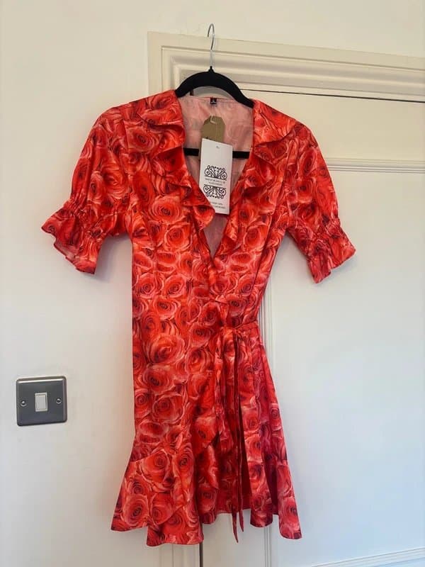 Never Fully Dressed Never fully dressed floral top