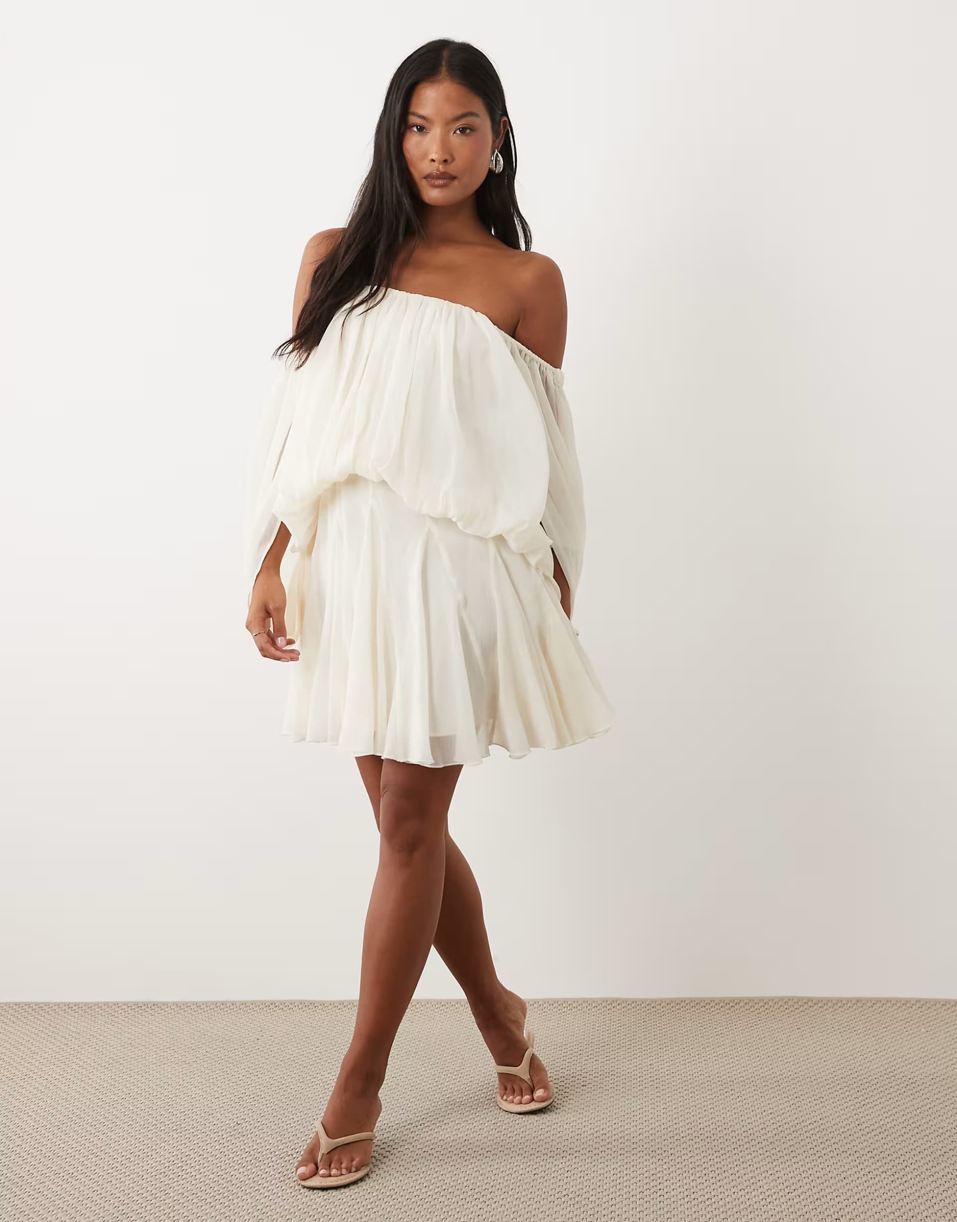 ASOS ASOS DESIGN Petite blouson mini dress with split sleeve and volume godet skirt in cream