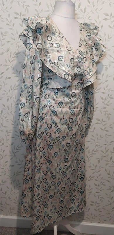 Never Fully Dressed Never Fully Dressed. Long dress. Size 8.