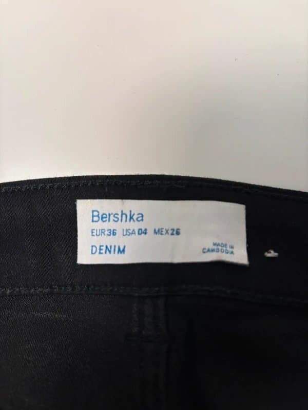 Bershka Slim black jeans with cuts on the waist