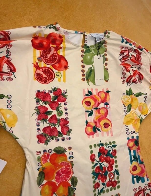 Never Fully Dressed Cute Never fully dressed fruit mini dress with tie back and tie arms