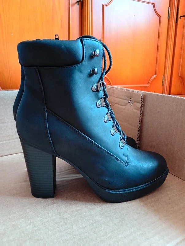 New Look Ladies high heeled, lace up boots.