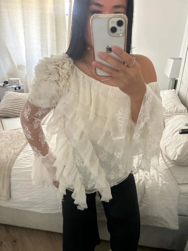 Asymmetric lace flower appliqué frill long sleeve blouse top