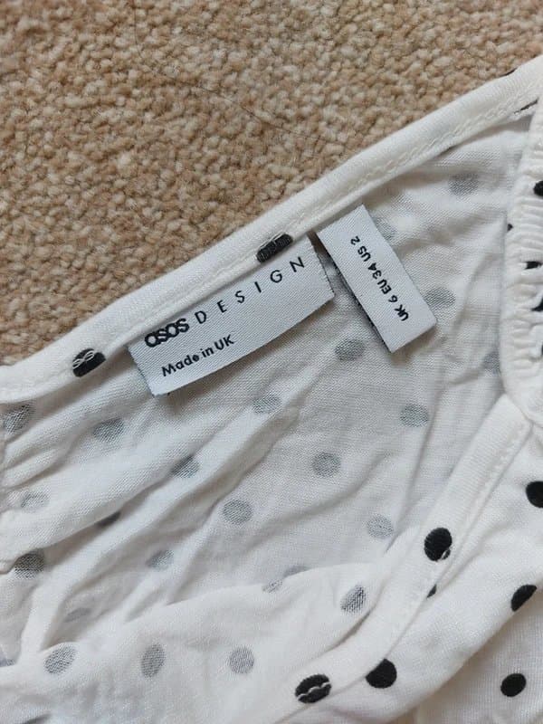 ASOS Size 6 Asos polka dot ruched front off the shoulder long sleeve crop top.