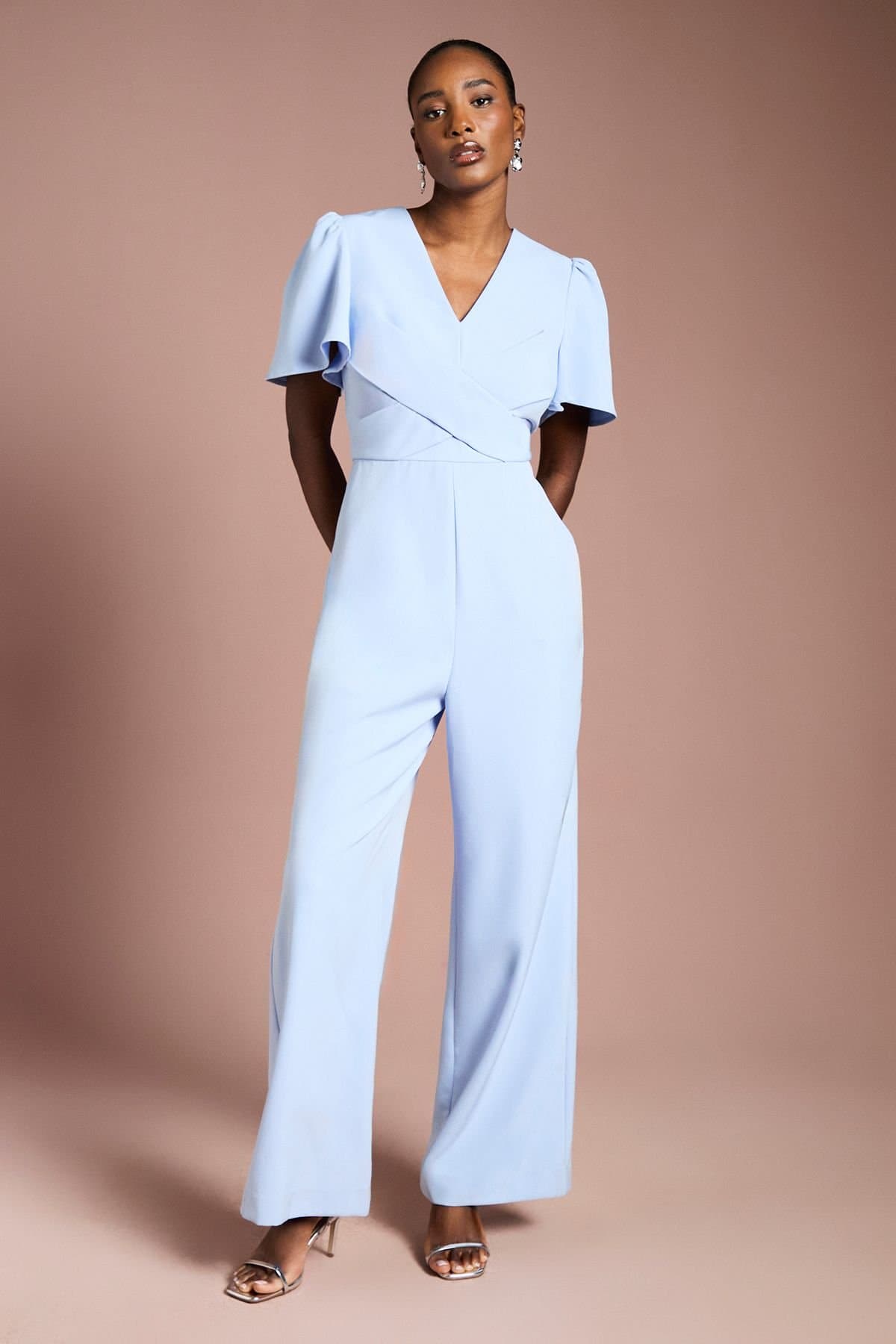 Coast Coast Women's V Neck Short Sleeve Wrap Waist Jumpsuit in Cornflower Blue