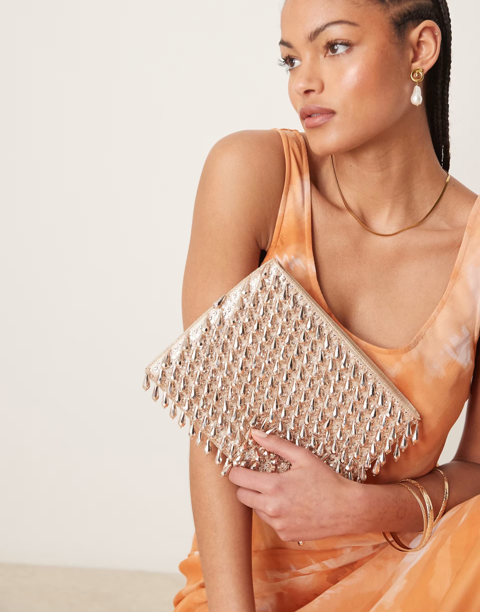 ASOS ASOS DESIGN Beaded Zip Top Clutch Bag in Rose Gold
