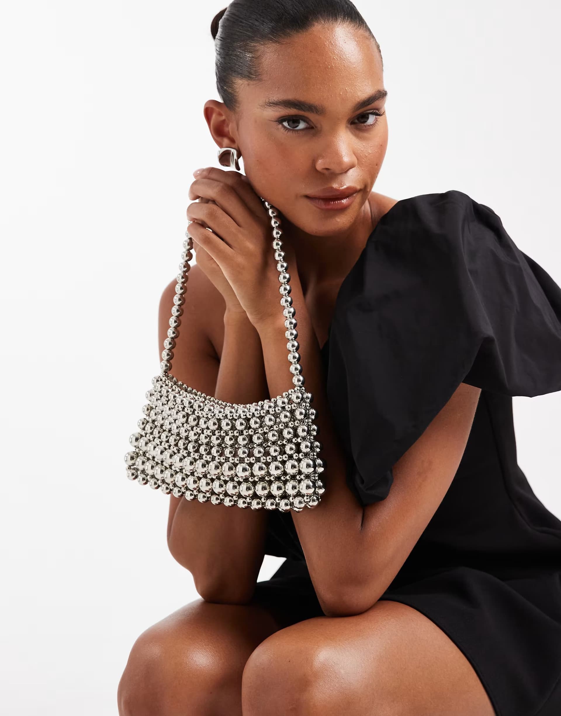 ASOS ASOS DESIGN metal beaded clutch bag in silver