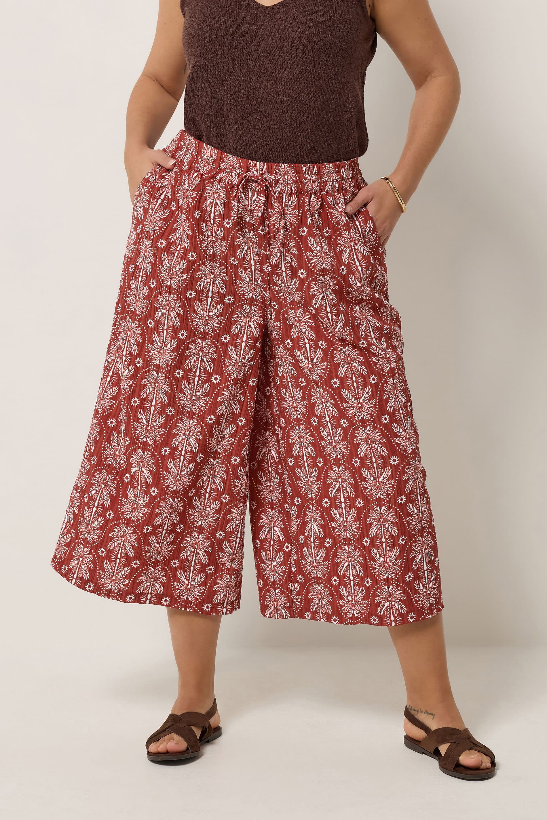 Yours Plus Size Rust Orange Palm Tree Cropped Trousers