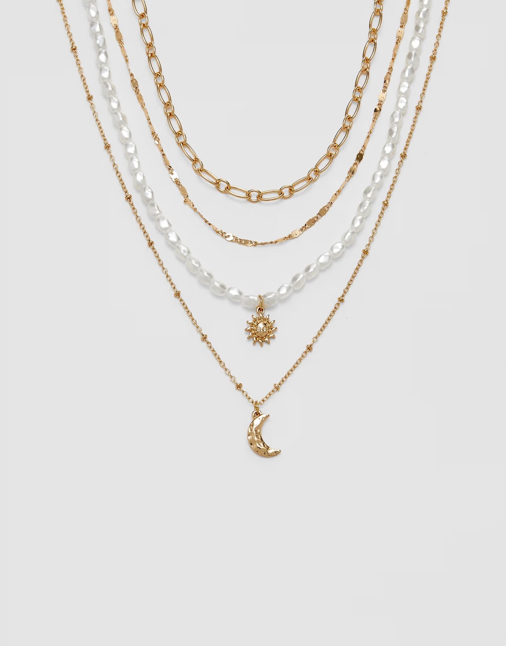 ASOS Stradivarius Set of 4 moon and sun necklaces in gold