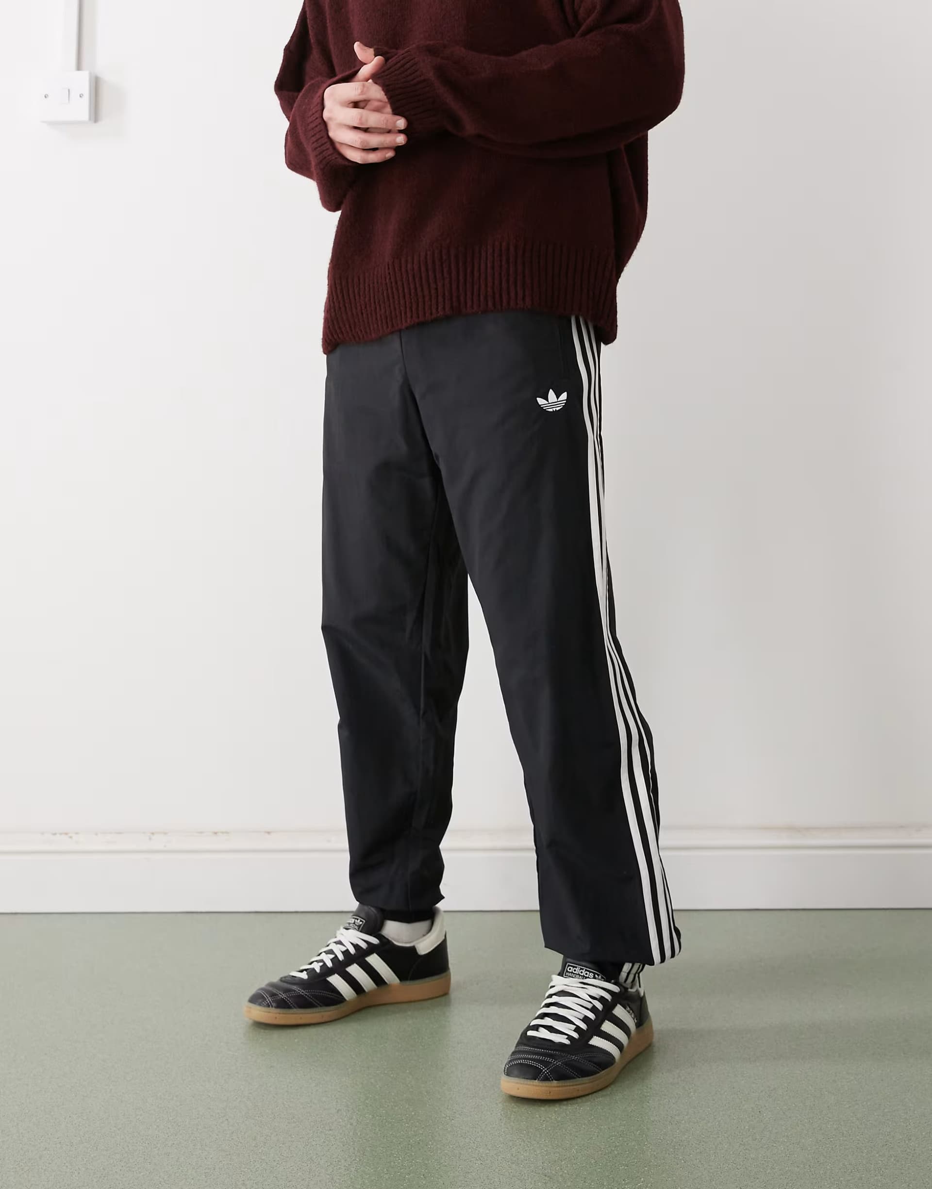 ASOS adidas Originals firebird woven track pants in black