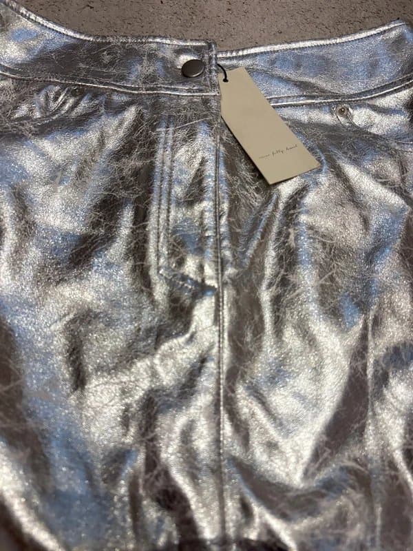 Never Fully Dressed Brand new with tags size 10 Never Fully dressed silver vegan leather skirt