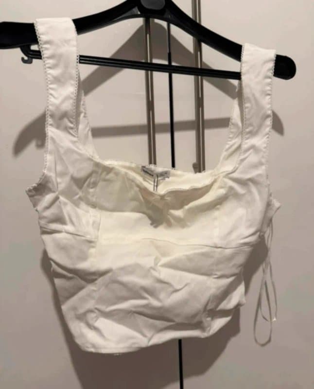 Bershka Bershka corset zip up top with mini bow detail