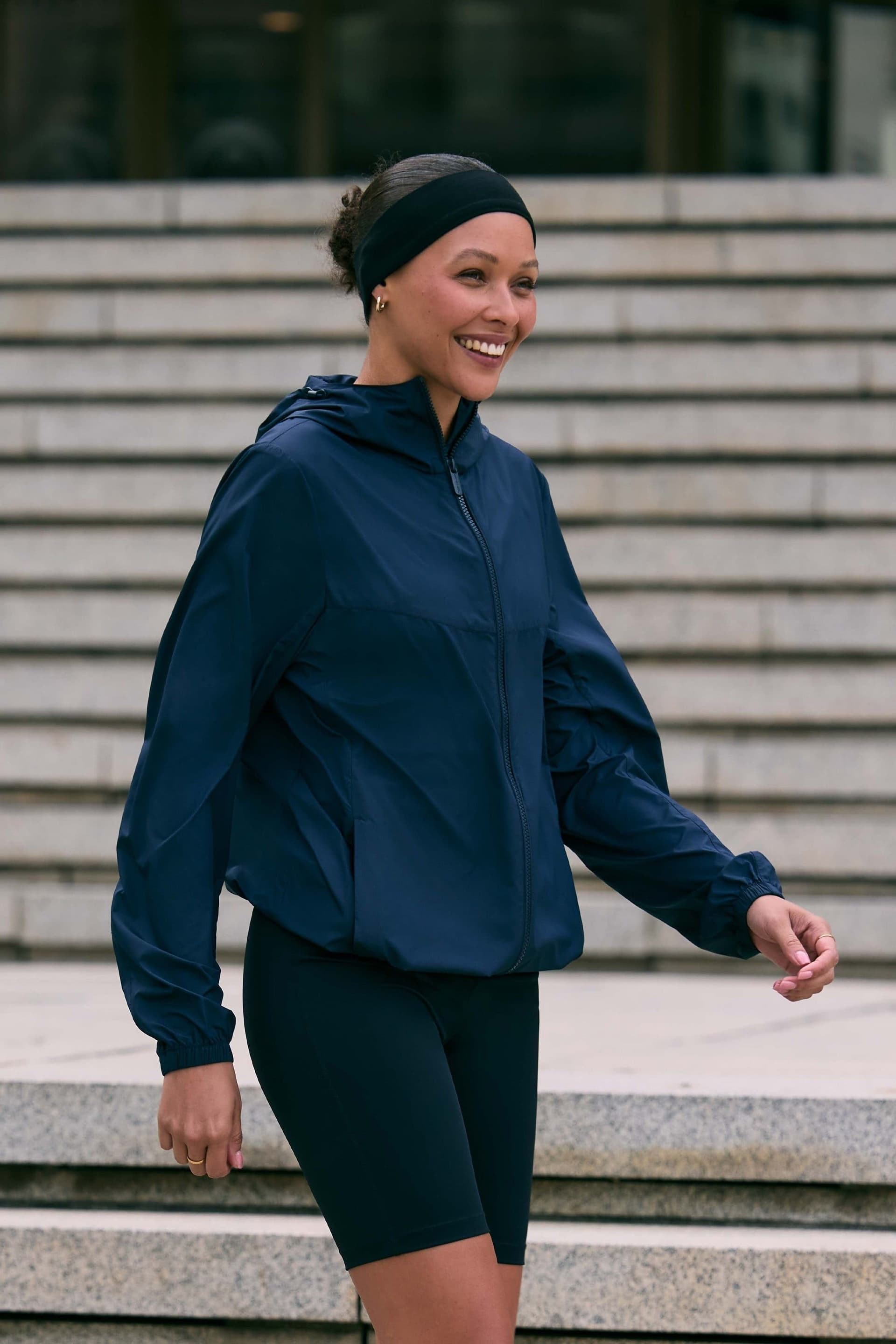 Animal Animal Women's 'Sunrise' Lightweight Water Resistant UV Protection Packable Jacket in Navy
