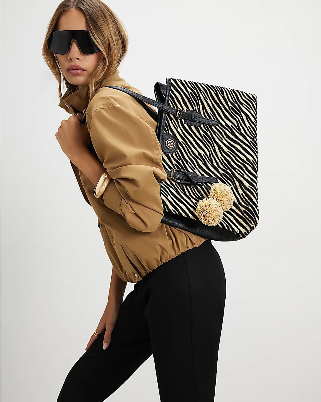 River Island River Island Womens Black Buckle Zebra Pom Pom Shopper Bag