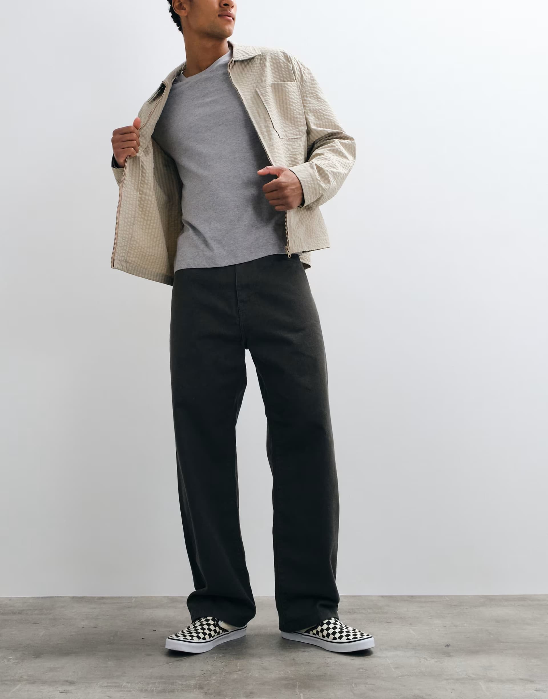 ASOS Carhartt WIP Landon loose-tapered fit trousers in charcoal