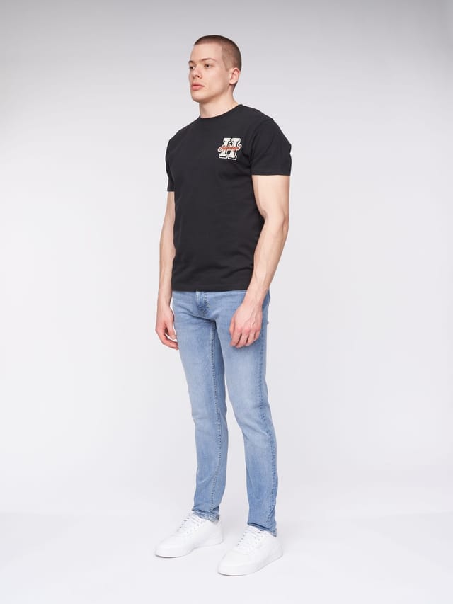 Henleys Henleys Mayhen Men's Skinny-Fit Stretch Denim Jeans with Signature Rubber Label Detail in Light Blue - 2