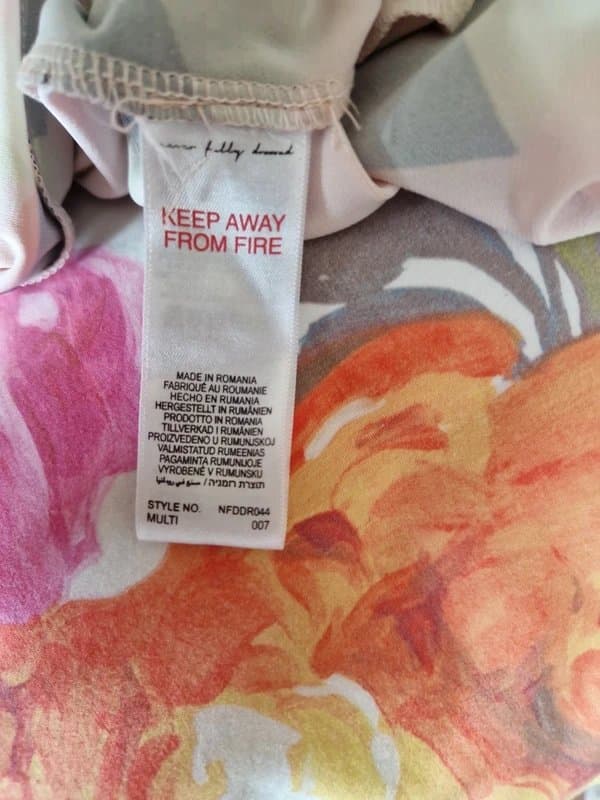 Never Fully Dressed Never fully dressed geometric design long dress with back split