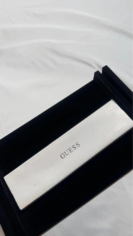 Guess Guess gold tone charm bracelet with heart charm brand new with box