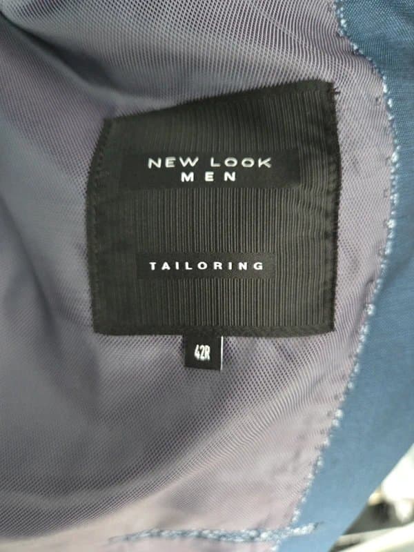 New Look Navy blue suit jacket, trousers and floral tie