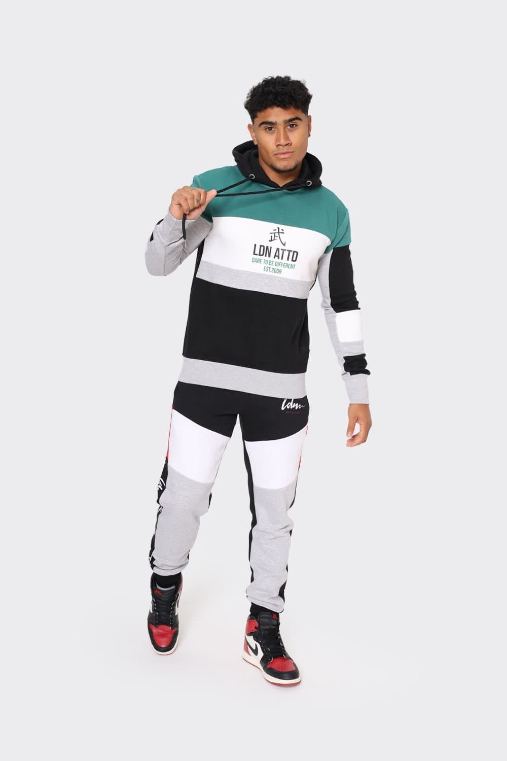 LONDON ATTITUDE LONDON ATTITUDE Men's Colorblock Cut & Sew Hoodie with 'Dare to Be Different' Printed Graphic in Black