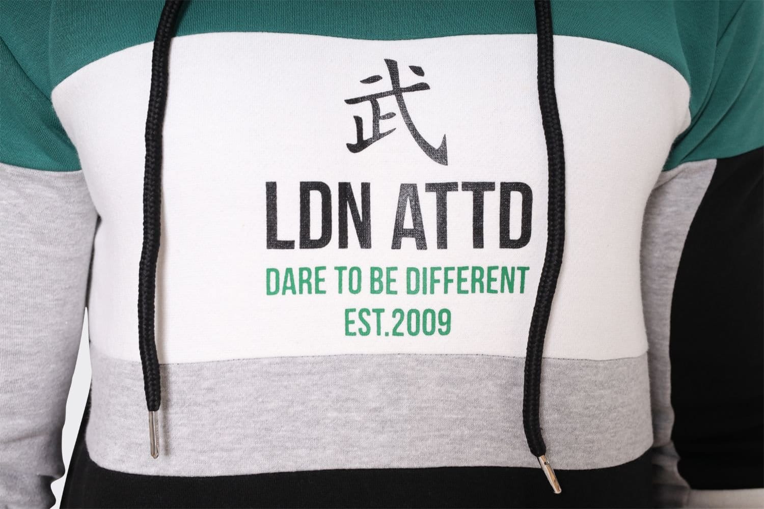 LONDON ATTITUDE LONDON ATTITUDE Men's Colorblock Cut & Sew Hoodie with 'Dare to Be Different' Printed Graphic in Black - 4