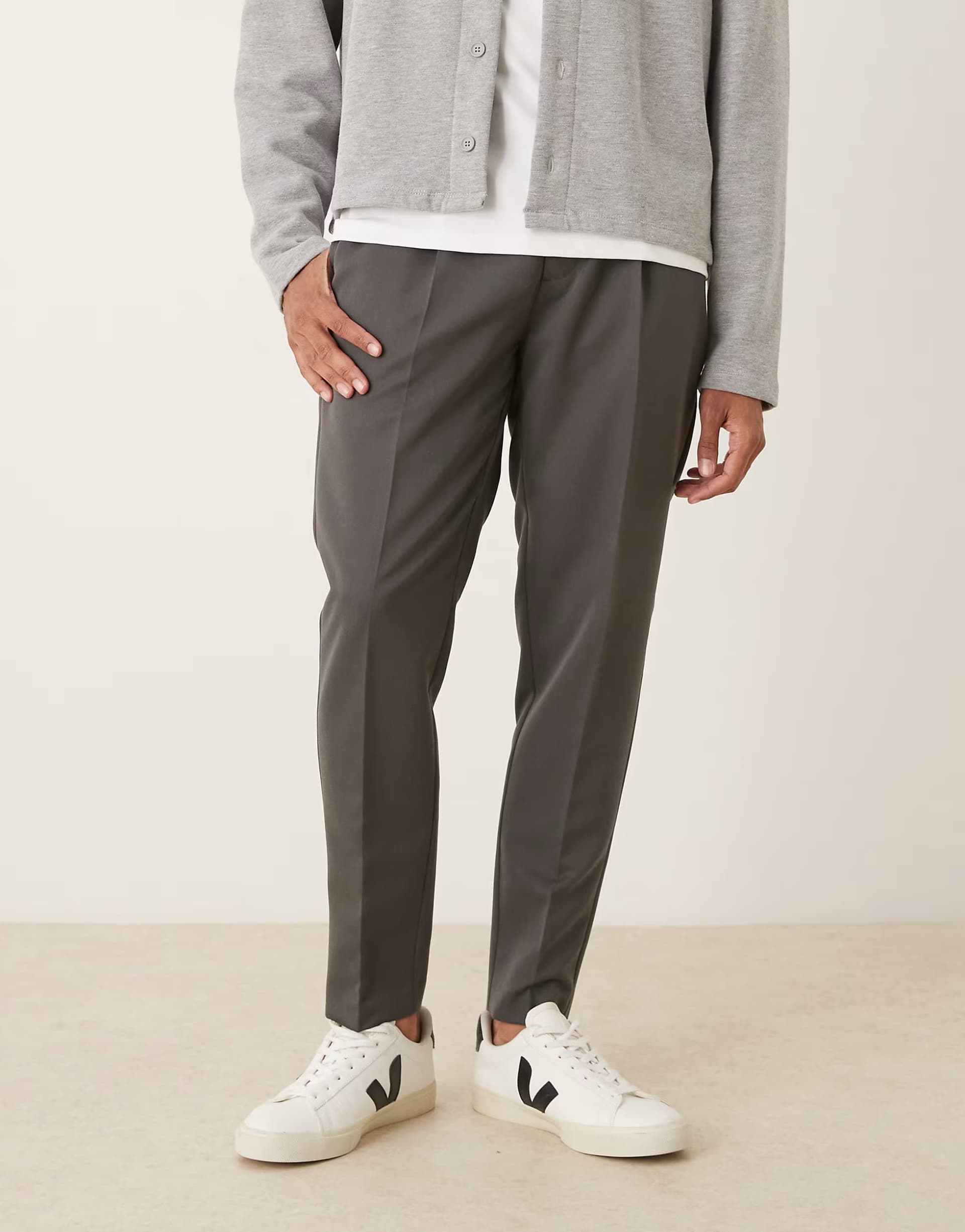 ASOS ASOS DESIGN tailored pleated tapered trousers in charcoal