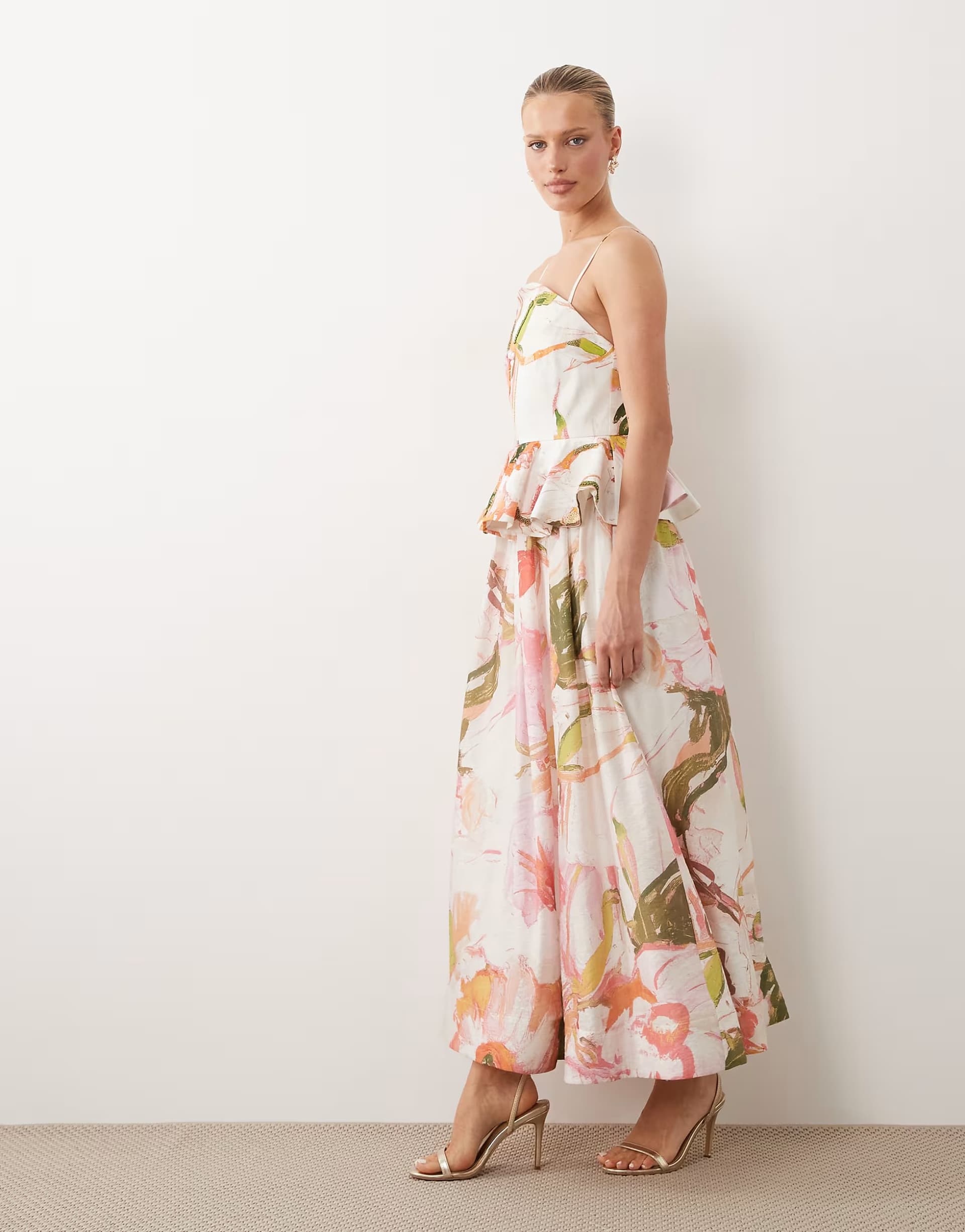 ASOS ASOS DESIGN embellished peplum midi dress in watercolour floral print