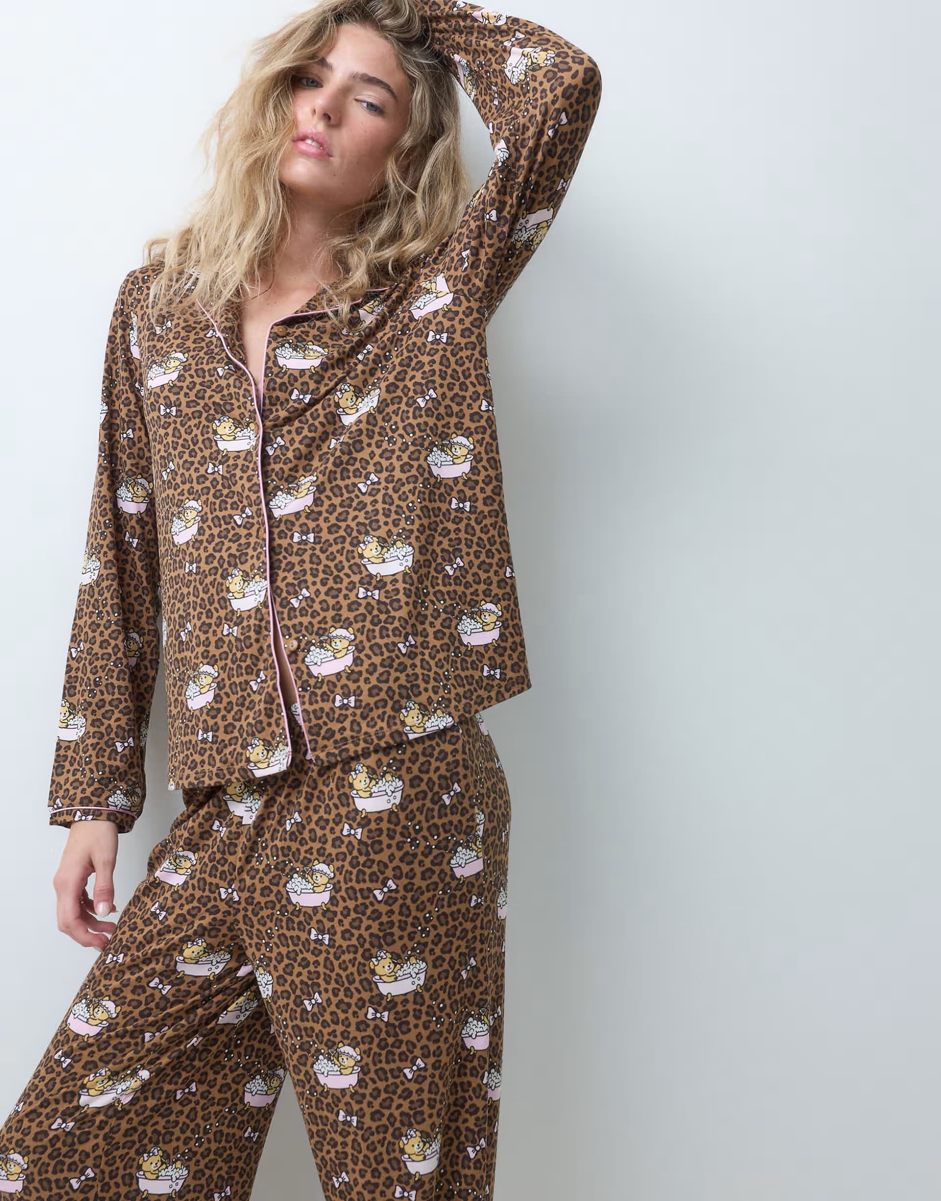 ASOS Urban Threads long sleeve button up shirt and trousers pyjama set in leopard teddy in bath print