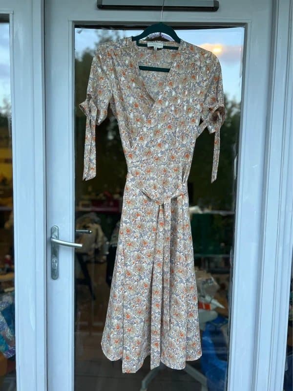 Never Fully Dressed Never fully dressed floral wrap dress