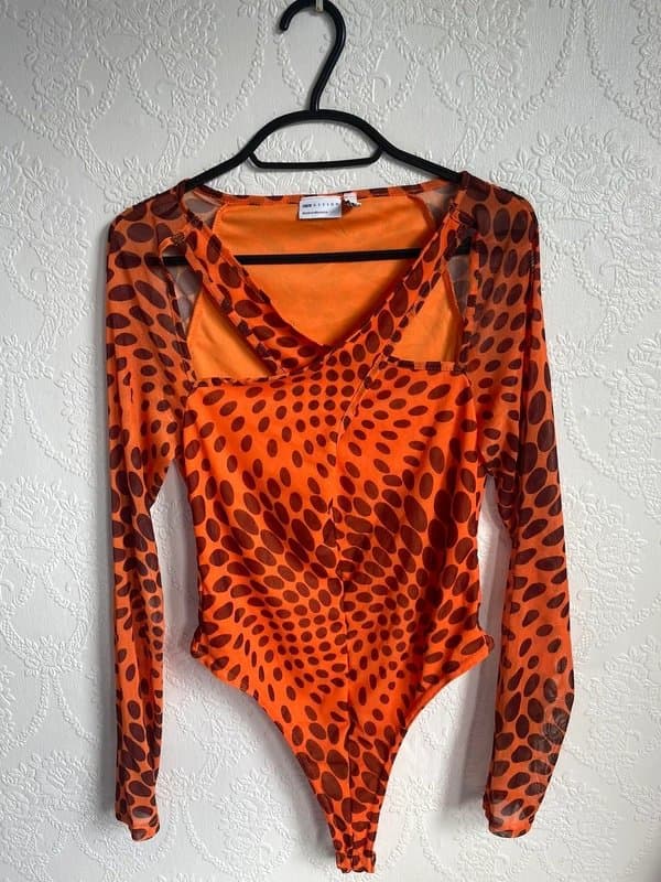 ASOS Design ASOS Design long sleeve wrap front bodysuit in orange spot print