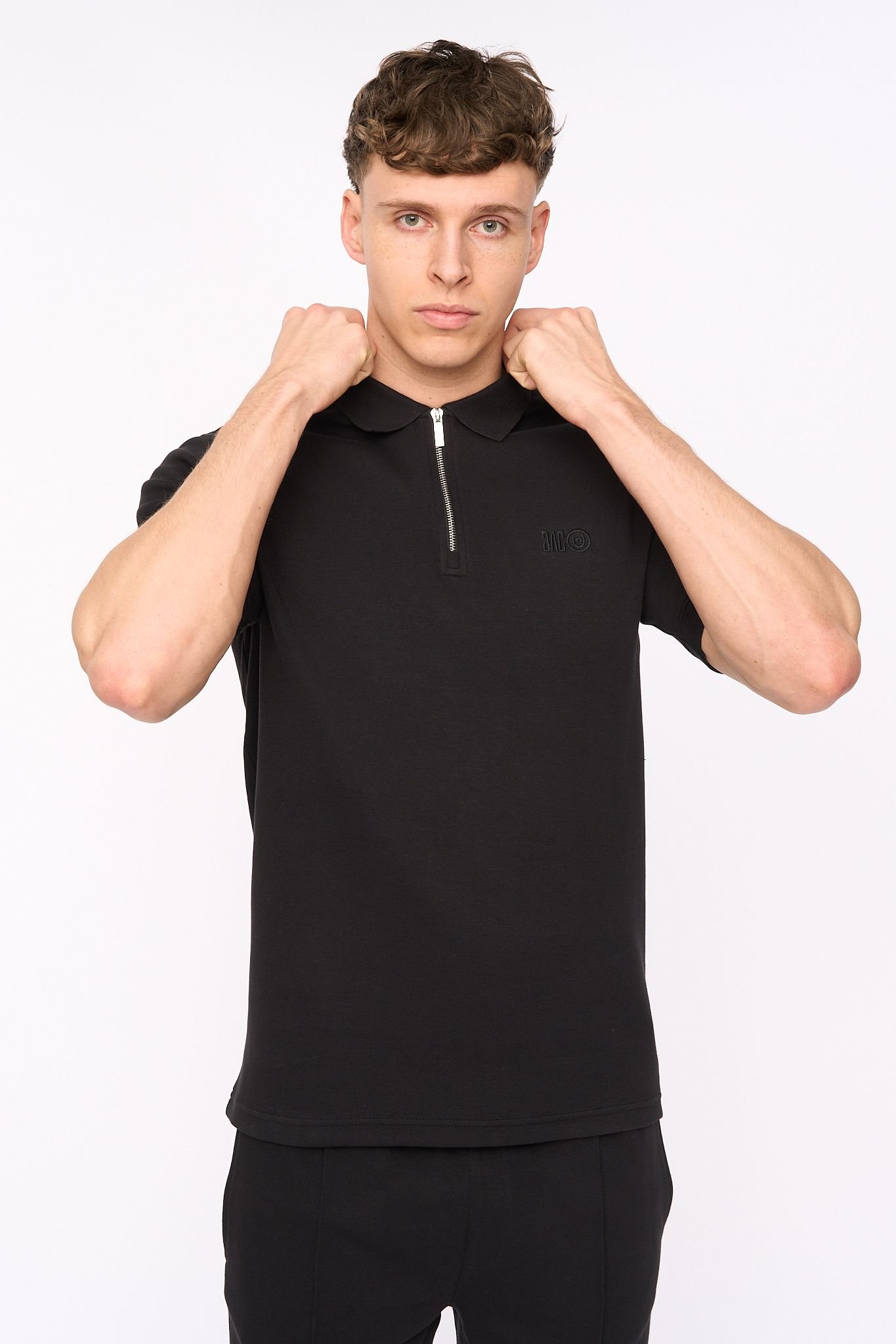 Duck and Cover Duck and Cover Men's Sherborn Smart Zip Polo with Sleeve Panels in Black - 3