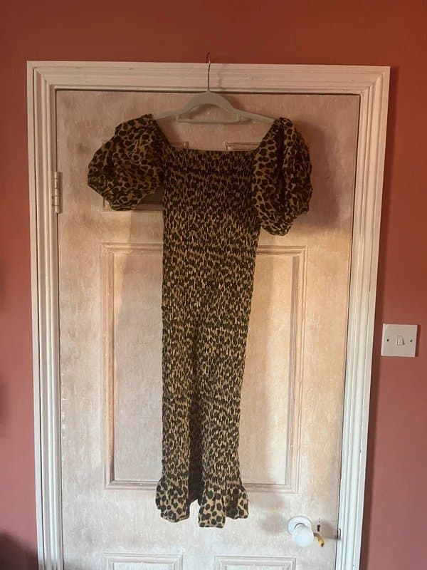 Never Fully Dressed Never fully dressed leopard midi