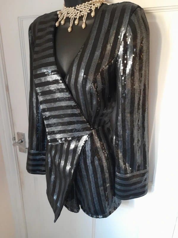River Island River island sexy silver / Black sequin playsuit / jumpsuit