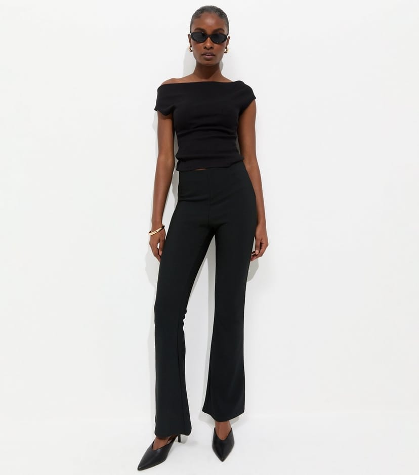 New Look Women's Black Ribbed Flared Trousers New Look - 1