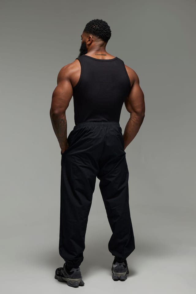 Training Dept. Training Dept. Men's Training Dept Woven Pump Pant in Black - 2